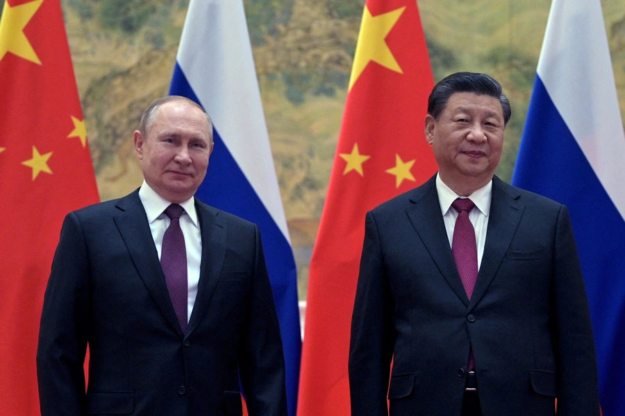 Russian President Vladimir Putin attends a meeting with Chinese President Xi Jinping in Beijing, China, on February 4, 2022.