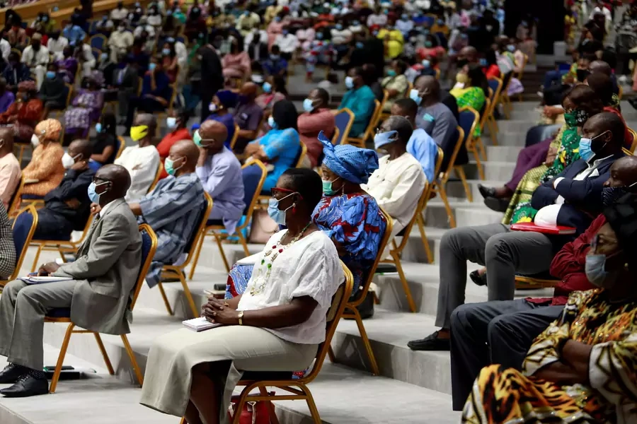 Worshippers wearing face masks attend a Sunday service at a church in Lagos, Nigeria on October 25, 2020.