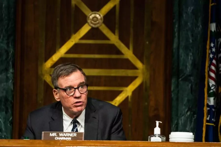 Senator Mark Warner (D-VA) speaks at a Senate Intelligence Committee hearing in February 2021. Warner is one of the cosponsors of a new cybersecurity bill which just passed the Senate.