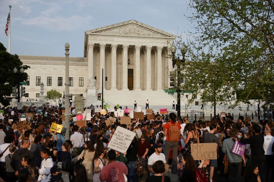 Demonstrators gather during a protest outside the U.S. Supreme Court on May 3, 2022, after the leak of a draft majority opinion that would overturn the landmark Roe v. Wade abortion rights decision.