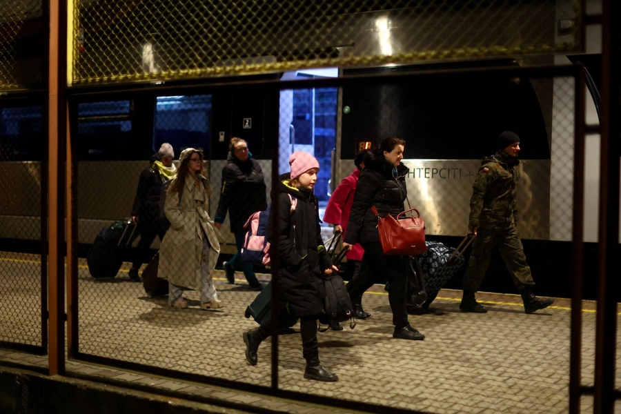 Ukrainian refugees disembark a train from Ukraine at Przemysl Glowny train station, after fleeing the Russian invasion of Ukraine, in Przemysl, Poland on April 3, 2022.