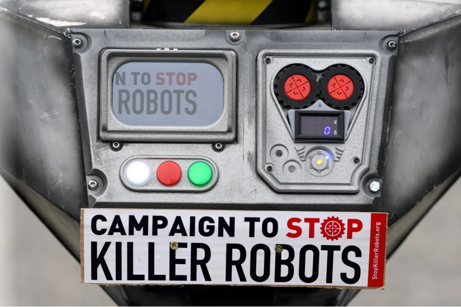 A sign attached to a robot is pictured as activists from the Campaign to Stop Killer Robots, a coalition of non-governmental organisations opposing lethal autonomous weapons or so-called 'killer robots', stage a protest at Brandenburg Gate in Berlin.