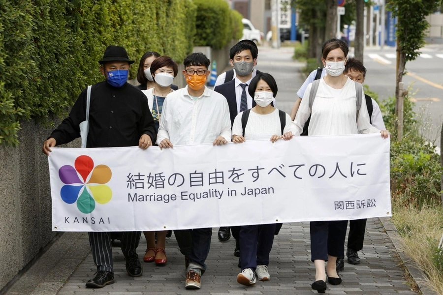 Plaintiffs head to the Osaka District Court before the court delivers a ruling on the legality of same-sex marriages in Osaka, Osaka Prefecture, Japan