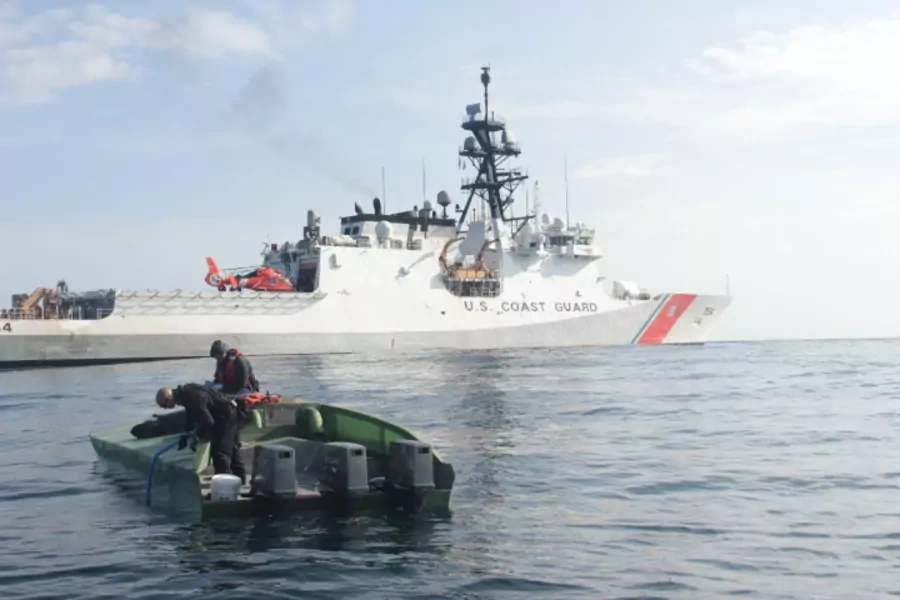 Coast Guard law enforcement personnel conduct a counter-narcotics boarding on a low profile vessel involved in drug smuggling in the eastern Pacific.