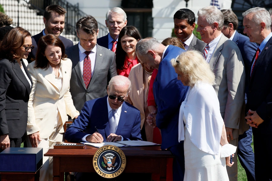 U.S. President Biden signs the CHIPS and Science Act of 2022, in Washington