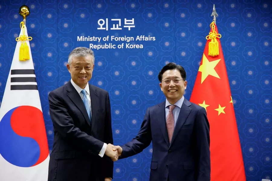 Chinese Special Representative on Korean Peninsula Affairs Liu Xiaoming and South Korea's Special Representative for Korean Peninsula Peace and Security Affairs Noh Kyu-duk during a meeting at the Foreign Ministry in South Korea on May 3, 2022. 