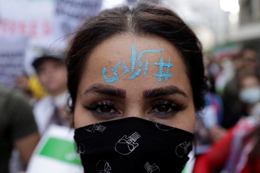 Demonstrators take part in a protest following the death of Mahsa Amini, in Istanbul.