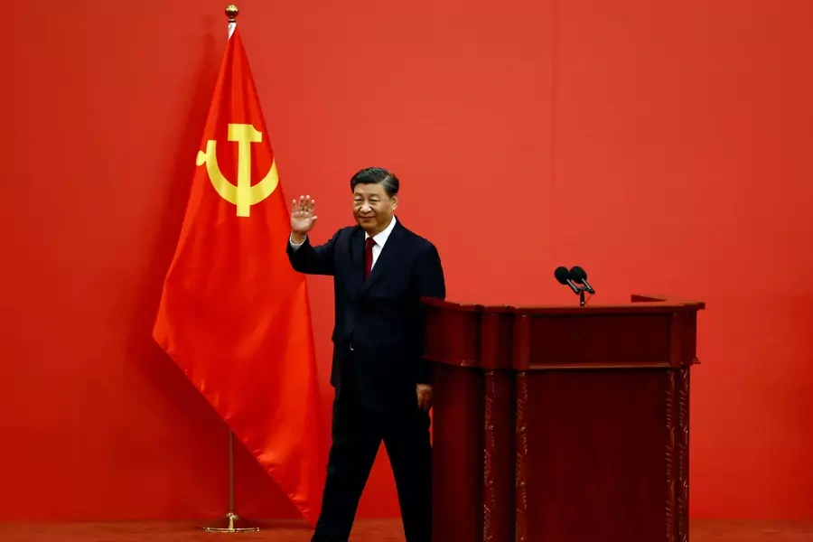 Chinese President Xi Jinping waves after his speech as the new Politburo Standing Committee members meet the media following the 20th National Congress of the Communist Party of China, at the Great Hall of the People in Beijing, China October 23, 2022.