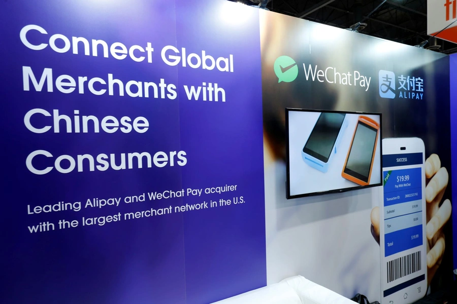 A display at the Citcon booth promotes WeChat Pay and Alipay during the Money 20/20 conference in Las Vegas, Nevada, on October 24, 2017.