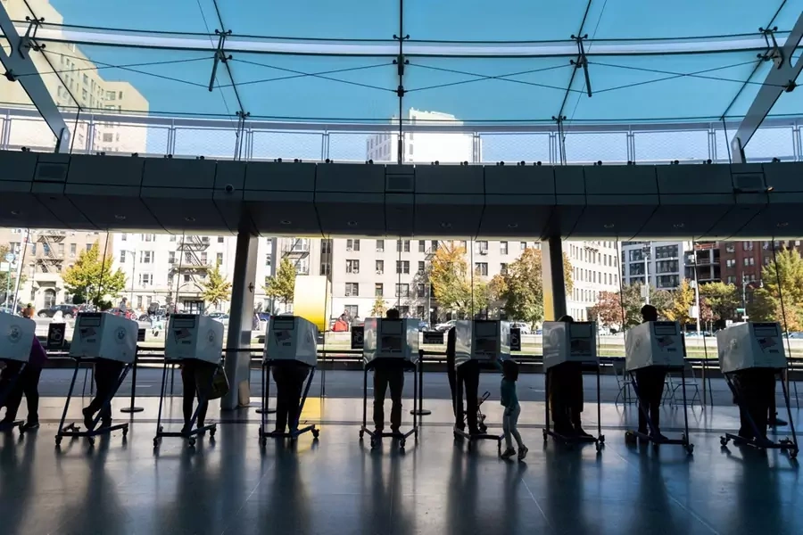 Voters cast their ballots at a polling station during early voting at the Brooklyn Museum in Brooklyn, New York City, New York on October 29, 2022