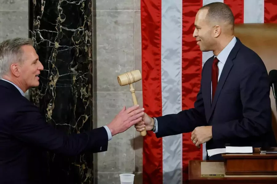 Minority Leader Hakeem Jeffries passes the gavel to Kevin McCarthy after McCarthy was elected Speaker of the House on January 7, 2023. 