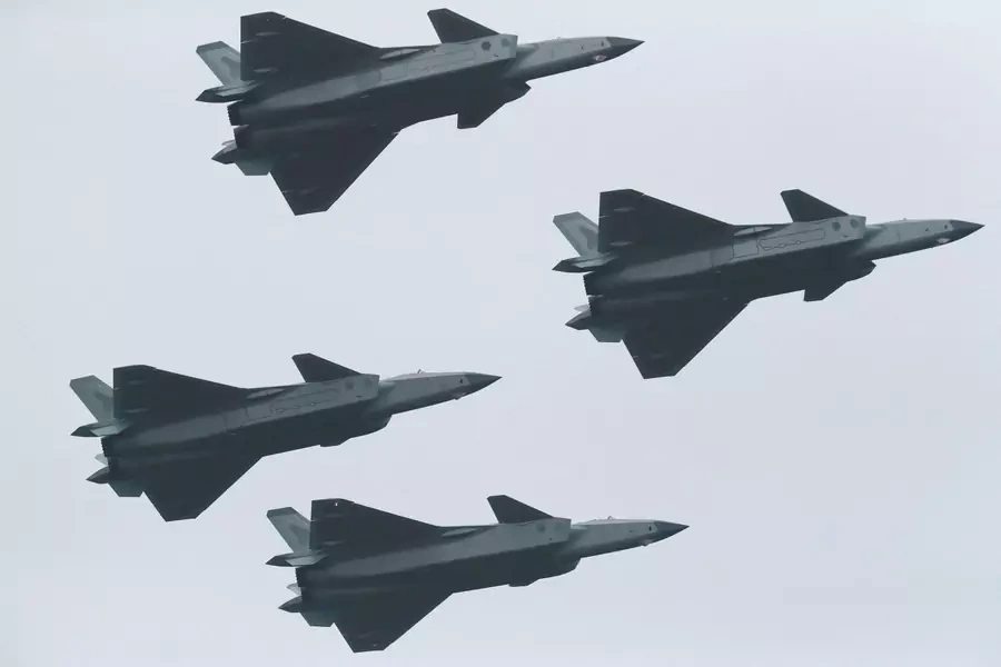J-20 stealth fighter jets of the Chinese People's Liberation Army (PLA) Air Force perform in formation at the China International Aviation and Aerospace Exhibition, or Airshow China, in Zhuhai, Guangdong province, China November 8, 2022.