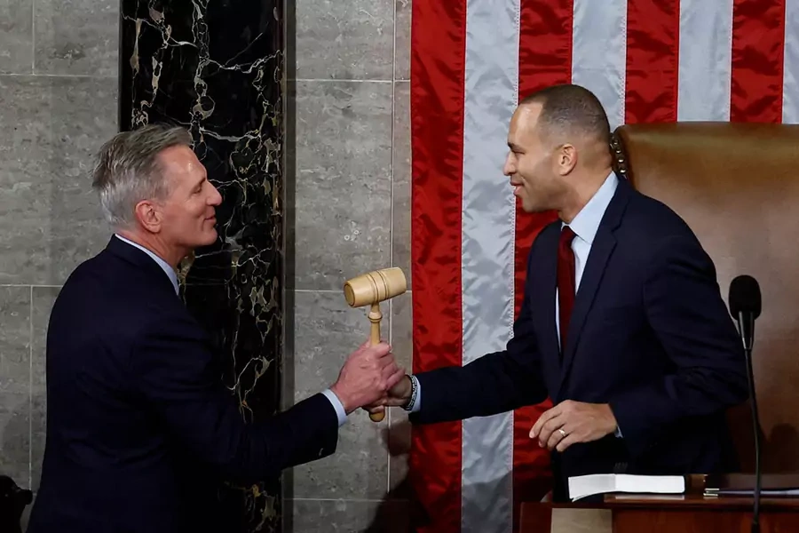 Minority Leader Hakeem Jeffries passes the gavel to Kevin McCarthy after McCarthy was elected Speaker of the House on January 7, 2023. 