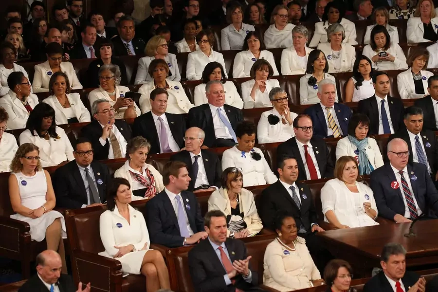 Female Democratic members of Congress dressed in white to highlight women's issues during former President Trump's address to Congress