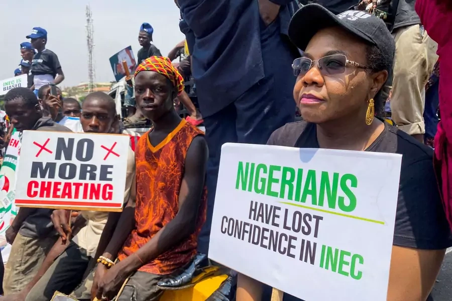 Supporters of the Peoples Democratic Party (PDP) protest at the national headquarters of the Independent National Electoral Commission (INEC) to disapprove the outcome of the February 25 election result in Abuja, Nigeria on March 6, 2023.