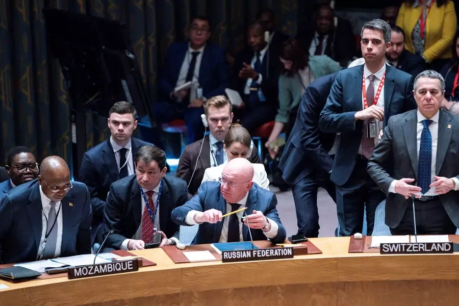 Russian Ambassador to the United Nations Vasily Nebenzya responds, as Ukraine's Foreign Minister Dmytro Kuleba asks for a minute of silence during a meeting at the United Nations Security Council to mark one year since Russia invaded Ukraine.