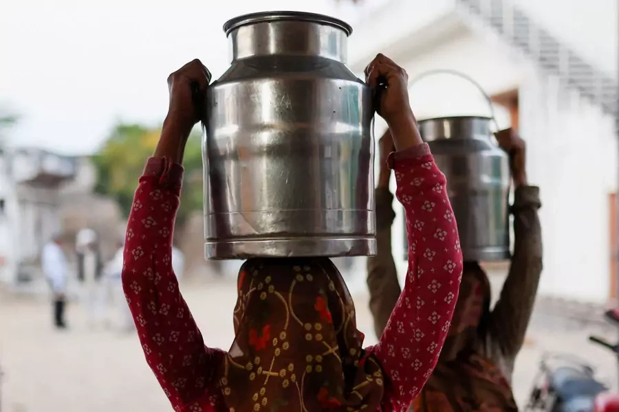 Women arrive at a milk collection centre on the outskirts of Jaipur.