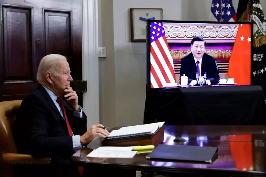 U.S. President Joe Biden speaks virtually with Chinese leader Xi from the White House in Washington