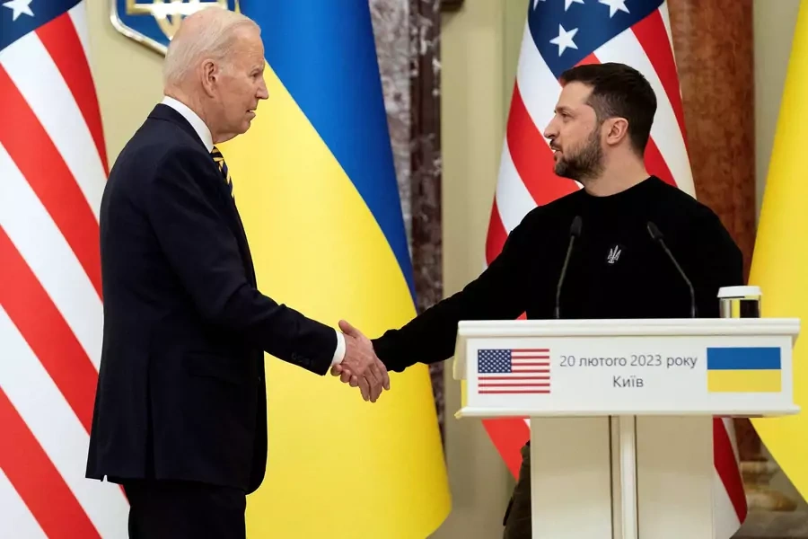 U.S. President Joe Biden shakes hands with Ukrainian President Volodymyr Zelenskiy after they both delivered statements at Mariinsky Palace on an unannounced visit in Kyiv, Ukraine, Monday, Feb. 20, 2023.