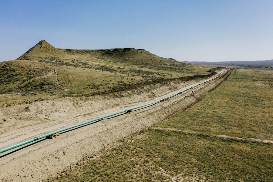 An extension of Denbury Inc's Greencore carbon pipeline in Montana is ready to be lowered into its trench.