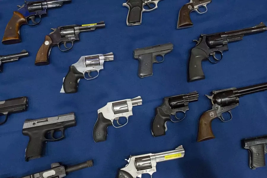 Confiscated illegal guns are displayed during a news conference at New York City Police (NYPD) Headquarters in New York
