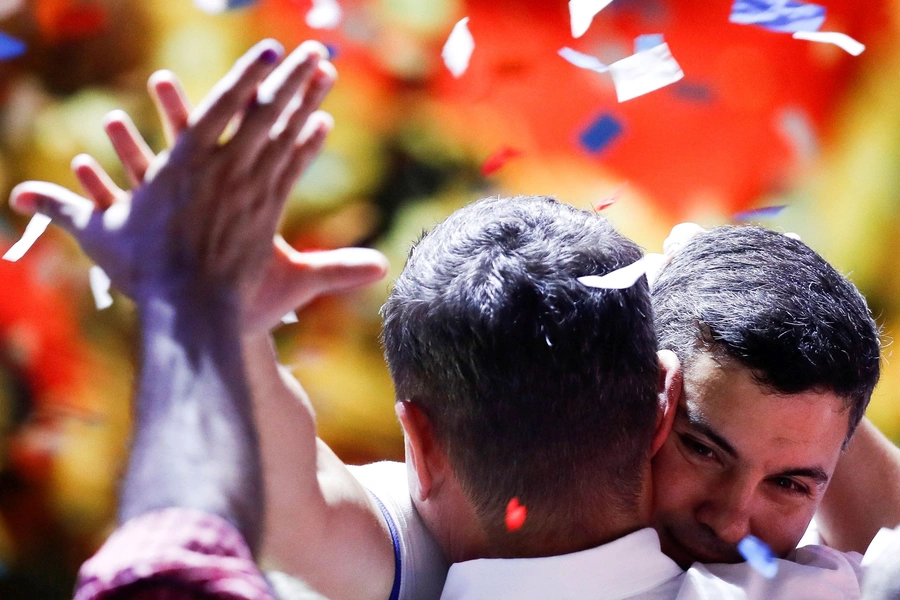 Paraguayan presidential candidate Santiago Peña from the ruling Colorado Party reacts at the party headquarters as he and his running mate Pedro Alliana won Paraguay’s presidential race, in Asunción, Paraguay, April 30, 2023.