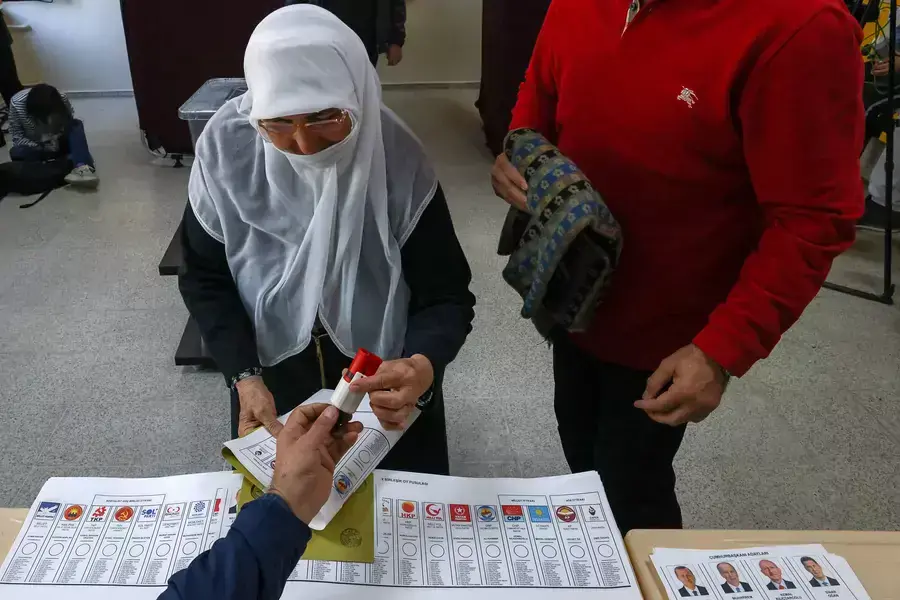 A woman attends the Turkish presidential and parliamentary elections, in Ankara, Turkey May 14, 2023. 