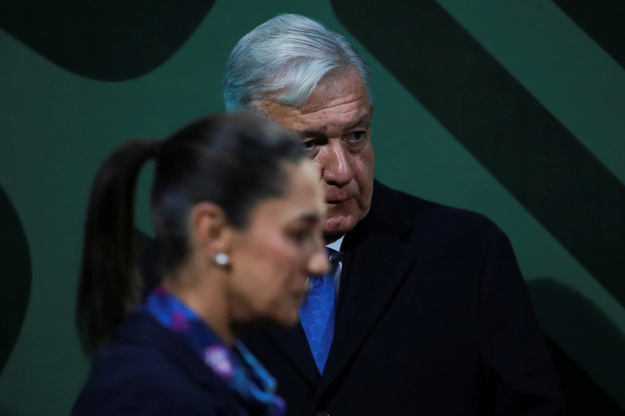 Mexico City’s Governor Claudia Sheinbaum walks past Mexico’s President Andrés Manuel López Obrador during a news conference in Mexico City, Mexico, January 20, 2023.