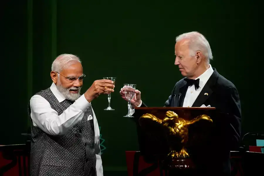 U.S. President Joe Biden and India's Prime Minister Narendra Modi toast during an official state dinner at the White House in Washington.