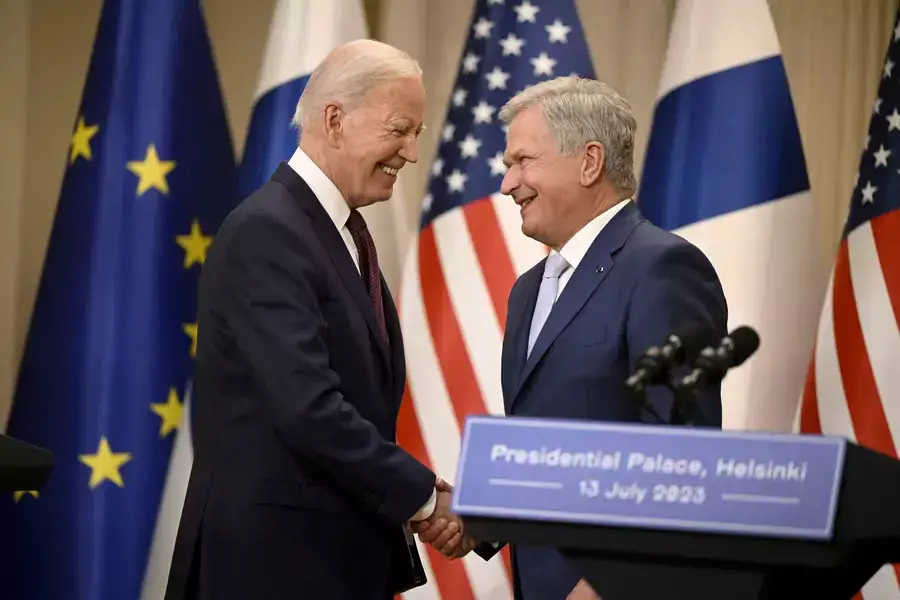 US President Joe Biden and Finnish President Sauli Niinisto shake hands at the end of their joint press conference in Helsinki, Finland, on July 13, 2023. 