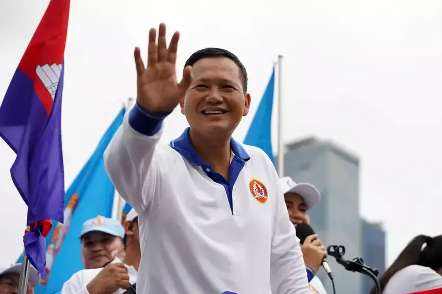 Hun Manet, son of Cambodia's Prime Minister Hun Sen, waves to people during the final Cambodian People's Party (CPP) election campaign for the upcoming general election in Phnom Penh, Cambodia, on July 21, 2023.