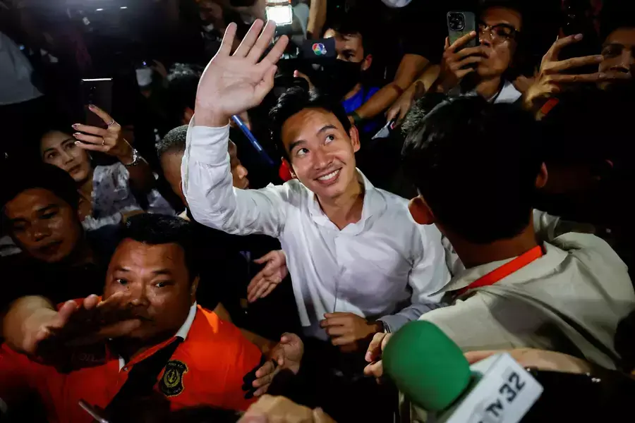 Move Forward Party leader and prime ministerial candidate, Pita Limjaroenrat, waves to the crowd during the general election in Bangkok, Thailand.