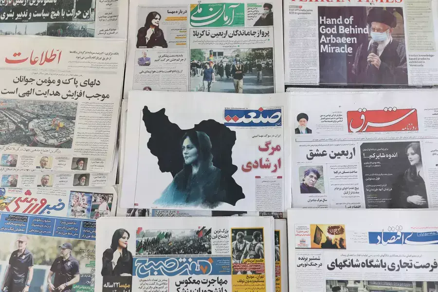 Newspapers, with a cover picture of Mahsa Amini, a woman who died after being arrested by the Islamic republic's "morality police" are seen in Tehran, Iran September 18, 2022.