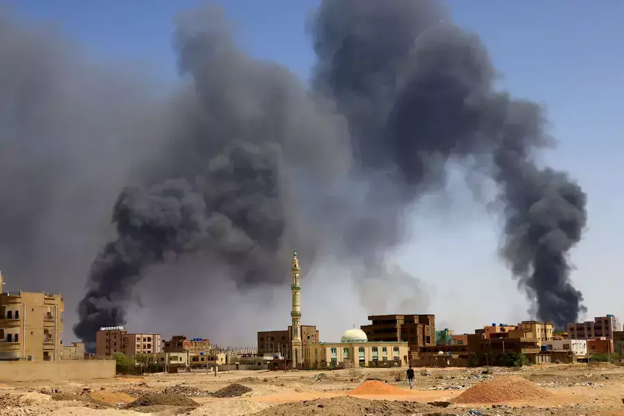 Smoke rises above buildings after an aerial bombardment during clashes between the Sudanese military and the paramilitary Rapid Support Forces in Khartoum on May 1, 2023.