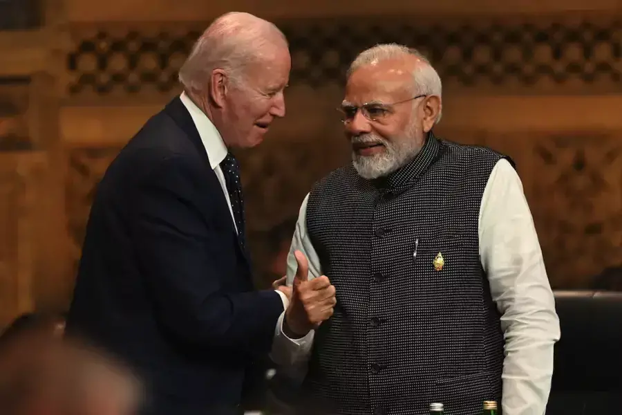 U.S. President Joe Biden speaks with Prime Minister of India Narendra Modi at the opening session of 2022’s G20 Summit held in Bali, Indonesia.