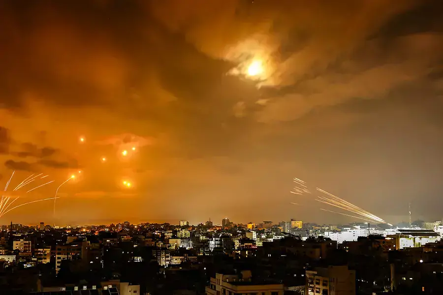 Rockets fired from Gaza City are intercepted by the Israeli Iron Dome defense missile system in the early hours of October 8, 2023.