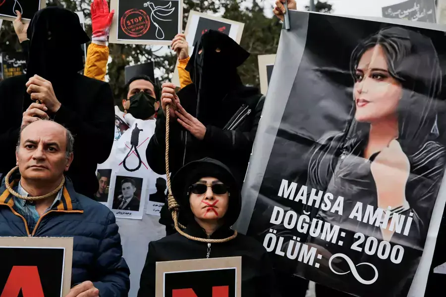 People take part in a protest against the Islamic regime of Iran following the death of Mahsa Amini, in Istanbul, Turkey on December 10, 2022