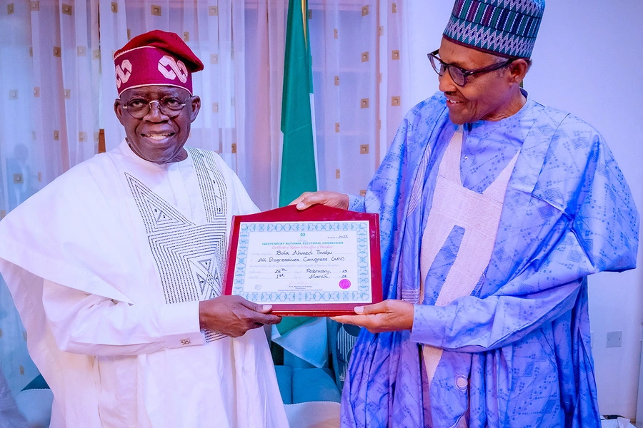 Former Nigerian President Muhammadu Buhari and Nigeria's newly declared winner of 2023 presidential election, Bola Tinubu pose for photograph in Daura, Nigeria on March 1, 2023..