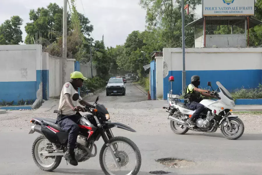 Members of the Haitian National Police (PNH) lead a convoy of cars carrying members of a Kenyan delegation as they leave the premises of the police after meeting with the Chief of the PNH Frantz Elbe, in Port-au-Prince, Haiti on August 21, 2023.
