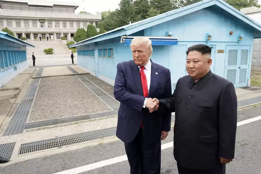U.S. President Donald Trump meets with North Korean leader Kim Jong Un at the demilitarized zone separating the two Koreas in Panmunjom, South Korea, on June 30, 2019.