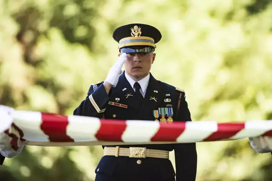 A soldier assigned to the 3rd U.S. Infantry Regiment, known as “The Old Guard,” participates in a military funeral at Arlington National Cemetery on September 13, 2023.