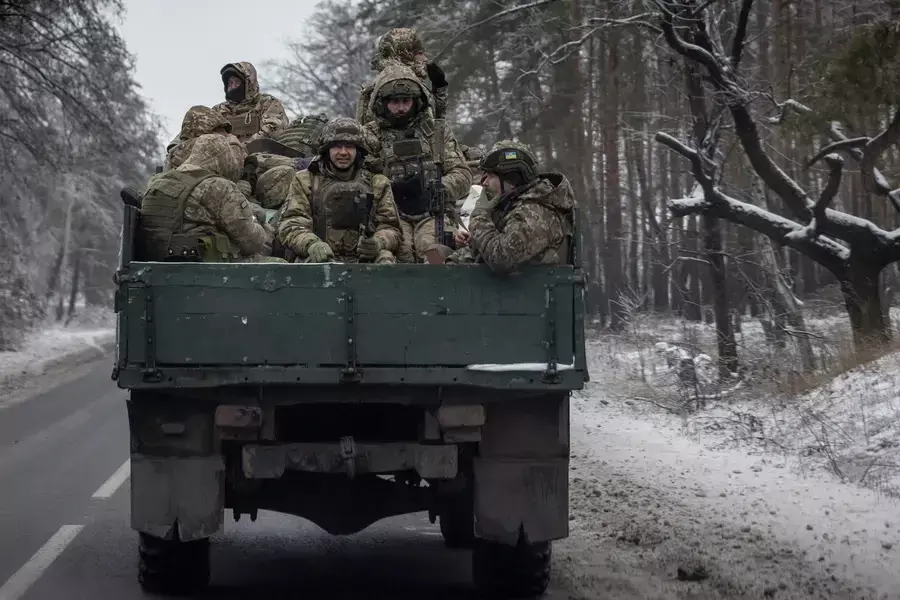 Ukrainian soldiers on a truck bed in the Donetsk region in Ukraine on December 17, 2023.