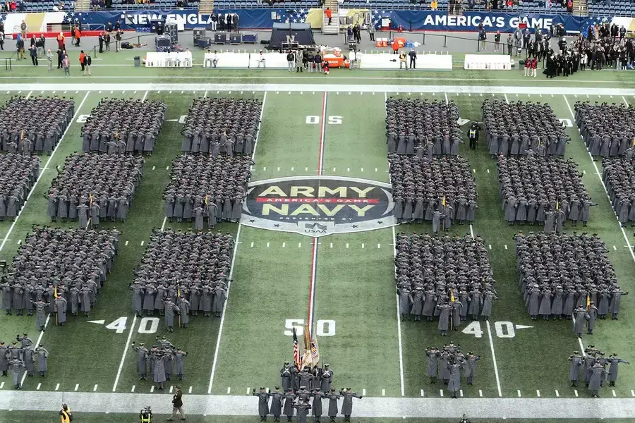 The Corps of Cadets from the U.S. Military Academy at West Point march on to the field before the Army-Navy game at Gillette Stadium, Foxborough, Massachusetts