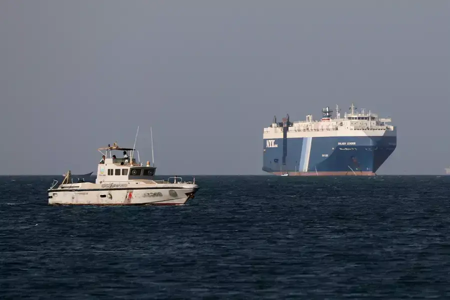 A Yemeni Coast Guard vessel on patrol in the Red Sea near the Galaxy Leader, a commercial vehicle carrier that Houthi commandos seized in November 2023.