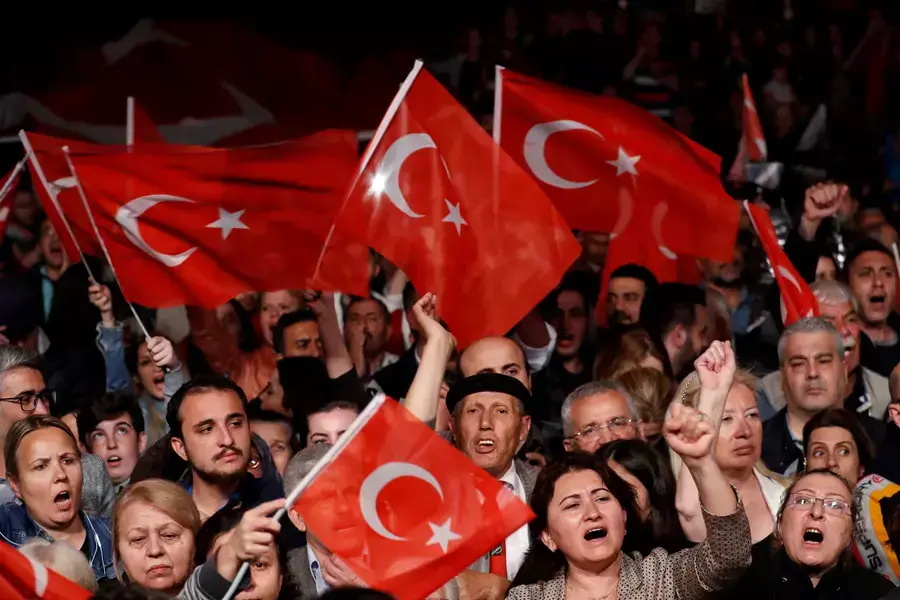 Supporters of the main opposition Republican People's Party (CHP) wave Turkish flags during a gathering to protest after the High Election Board (YSK) decided to re-run the mayoral election in Istanbul, Turkey, on May 6, 2019.