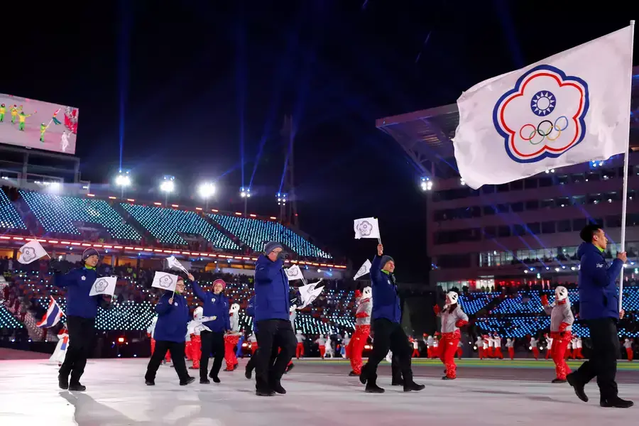 Te-An Lien of Taiwan carries the national flag during the opening ceremony for the Pyeongchang 2018 Winter Olympics in South Korea, on February 9, 2018.