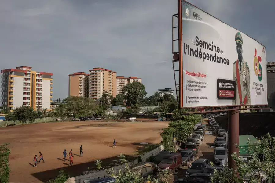 A billboard promoting a military parade to celebrate Guinea's independence is shown over the city of Conakry, Guinea on September 28, 2023. 