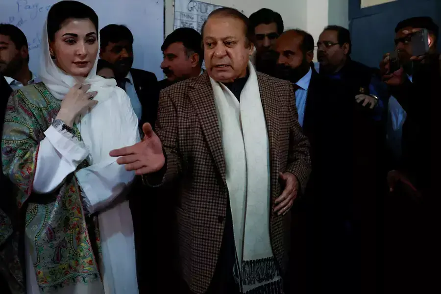 Former Prime Minister Nawaz Sharif speaks to members of the media as he arrives to cast his vote at a polling station during the general election in Lahore, Pakistan, on February 8, 2024.