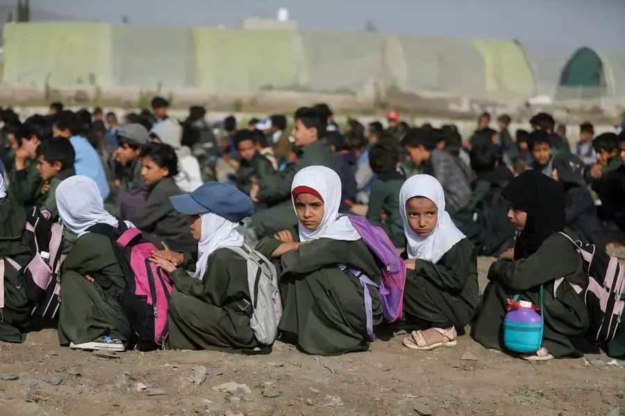 Students wait for the opening of a new school on the outskirts of Sanaa, Yemen, on September 2, 2023.