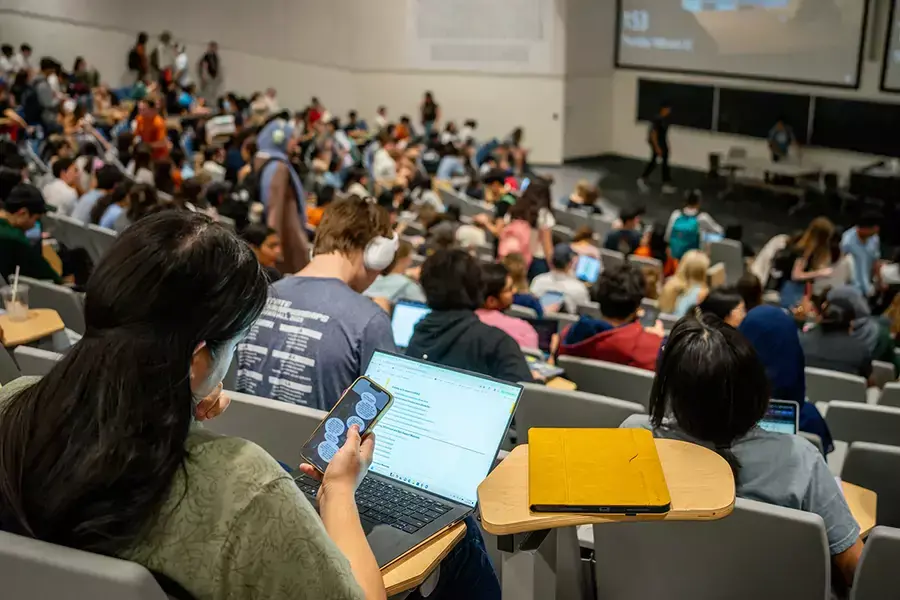  Students prepare for lecture at the University of Texas at Austin on February 22, 2024 in Austin, Texas. 